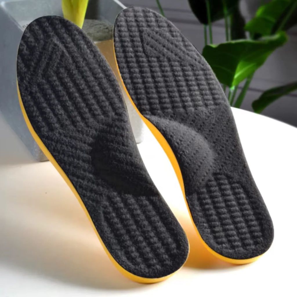 Par de palmilhas corretivas O pretas para supinação e pés cavos em cenário de bem-estar, destacando o design ergonômico Universo Vigor Saúde
